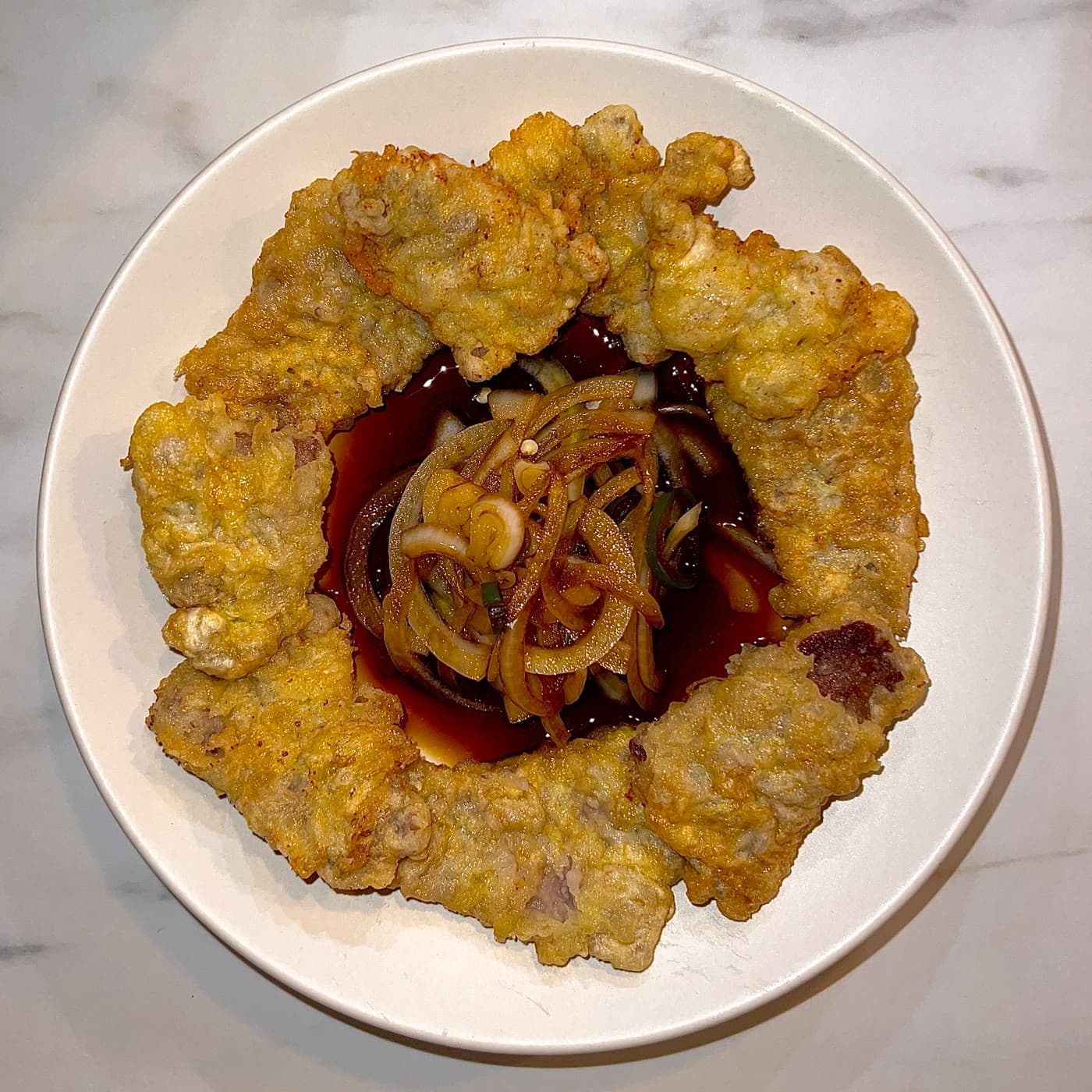 Yukjeon (Korean pan-fried beef), cooked by Brian